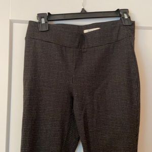 Stretchy leggings.  Tiny plaid.  Black with some light gray stitching.  Size xs